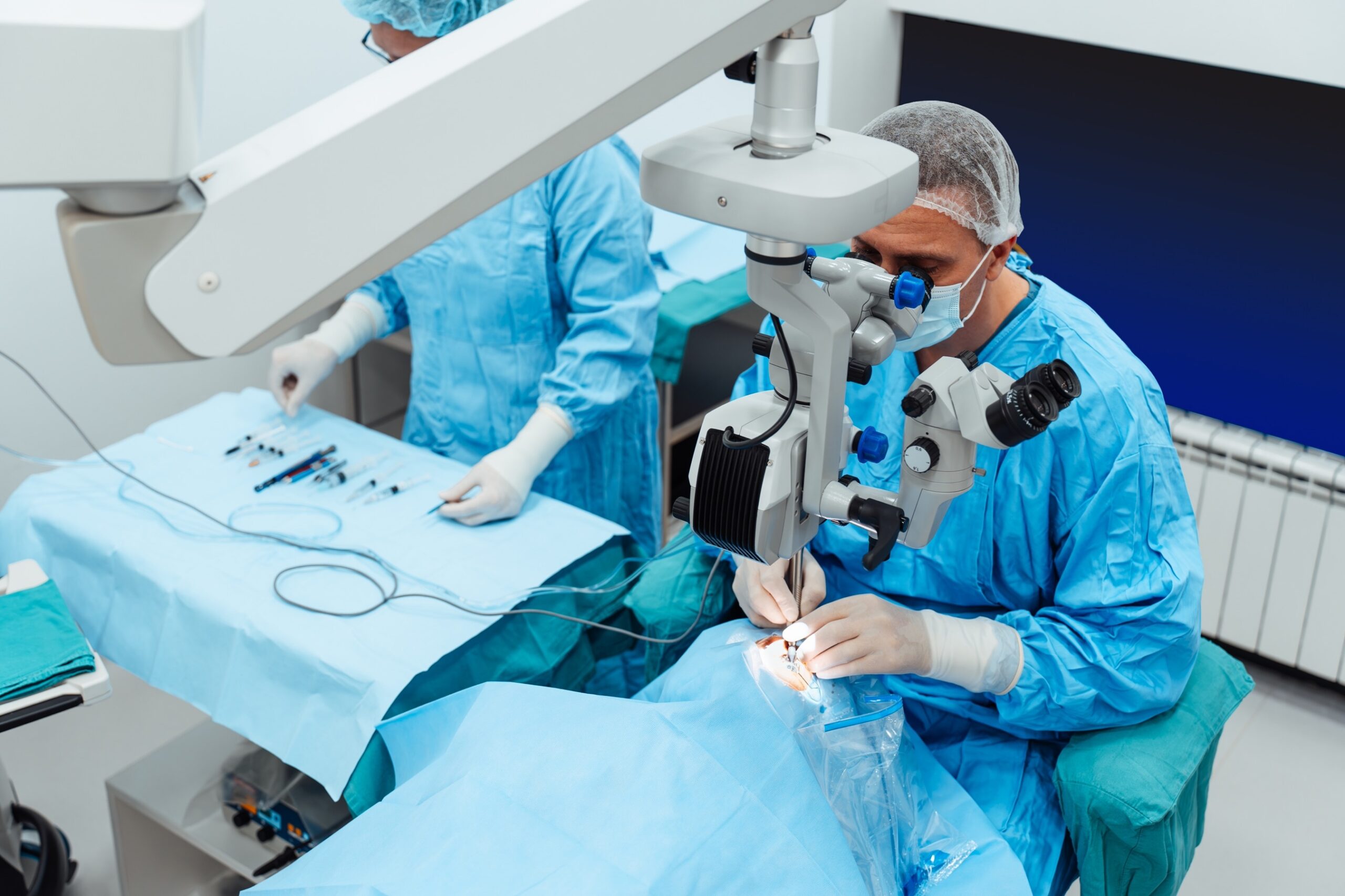 Surgeon and medical team performing eye surgery on a patient